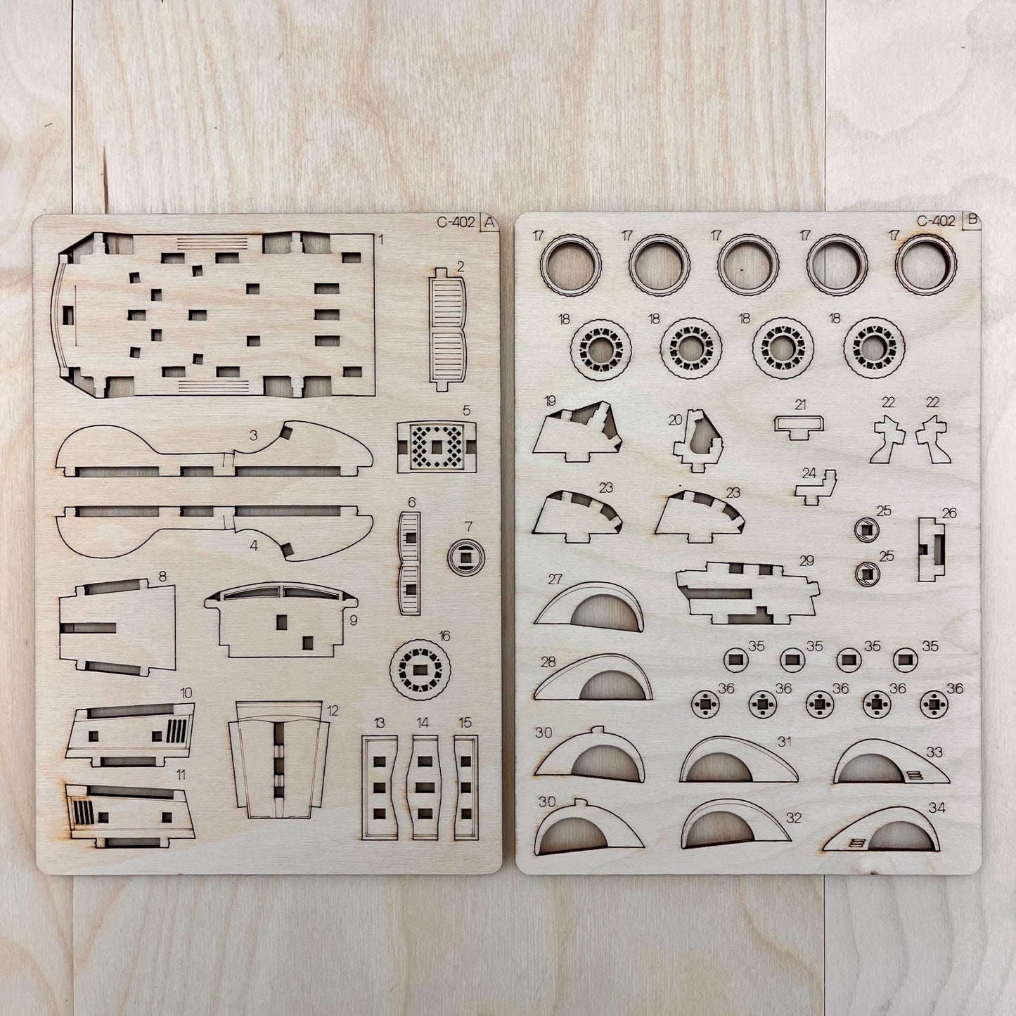 The sportcar model parts on a wooden surface