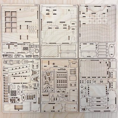 book nool model parts on a wooden surface