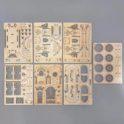 The caravan wagon model parts on a wooden surface
