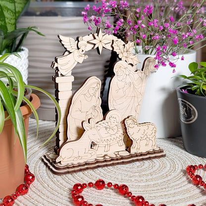 Wooden nativity scene with Mary, Joseph, and baby Jesus surrounded by potted plants and red beads.
