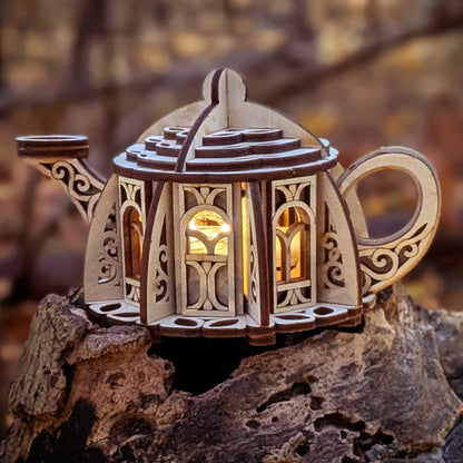 Wooden lantern with intricate carvings on a natural background