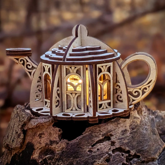 Wooden lantern with intricate carvings on a natural background