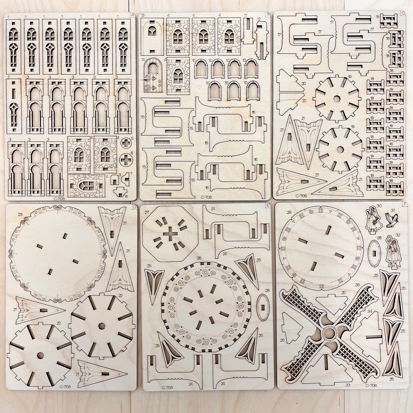 the mill model parts on a wooden surface