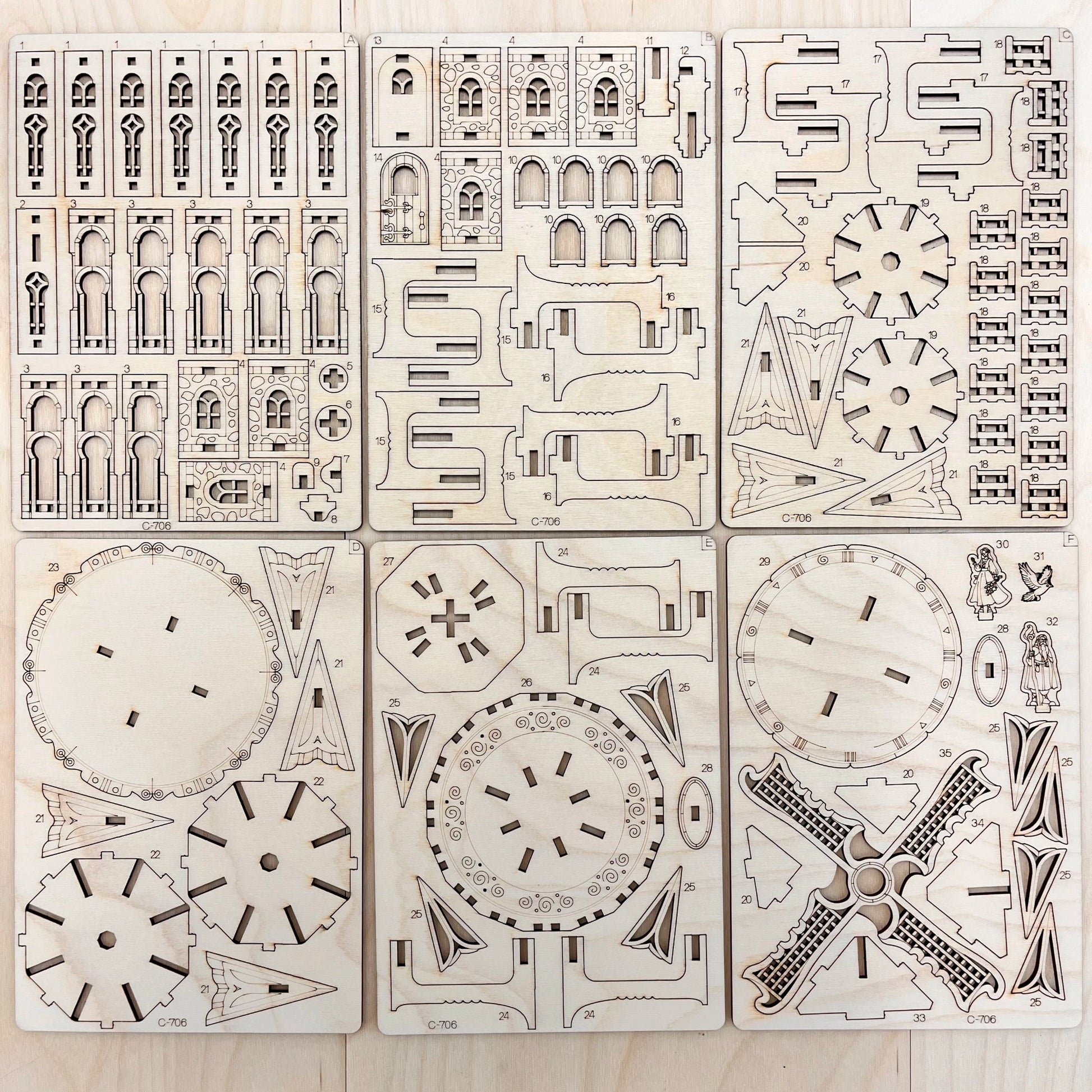 the mill model parts on a wooden surface