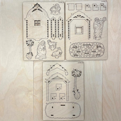 Set of Christmas nativity scene stencils on a wooden surface