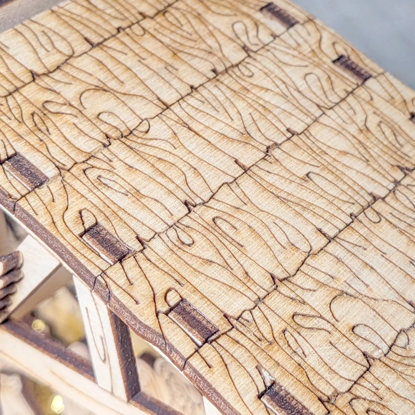 Wooden puzzle with interlocking pieces on a blurred background