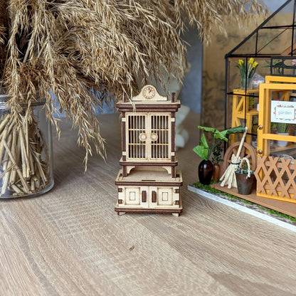 Detailed DIY wooden sideboard kit for dollhouse collectors, with intricate craftsmanship and classic furniture styling.