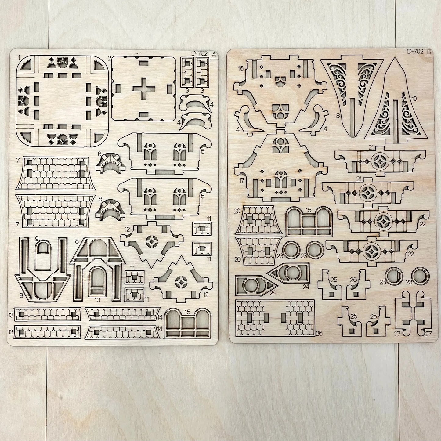 The house model parts on a wooden surface