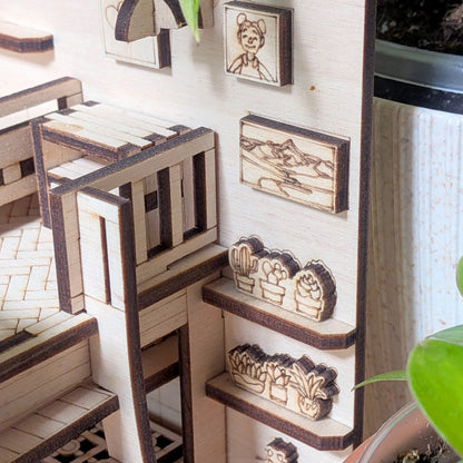 Miniature wooden shelves with decorative items in a dollhouse setting